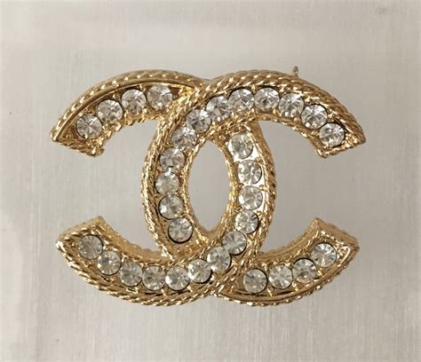 wholesale chanel pins|Chanel costume jewelry.